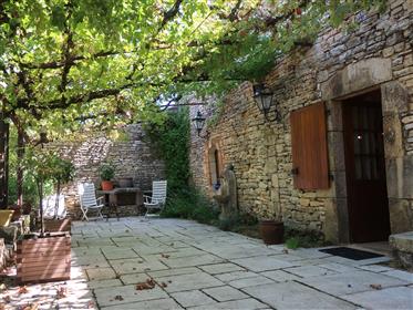 Charming old stone house with attached garage & garden of 1720 m²