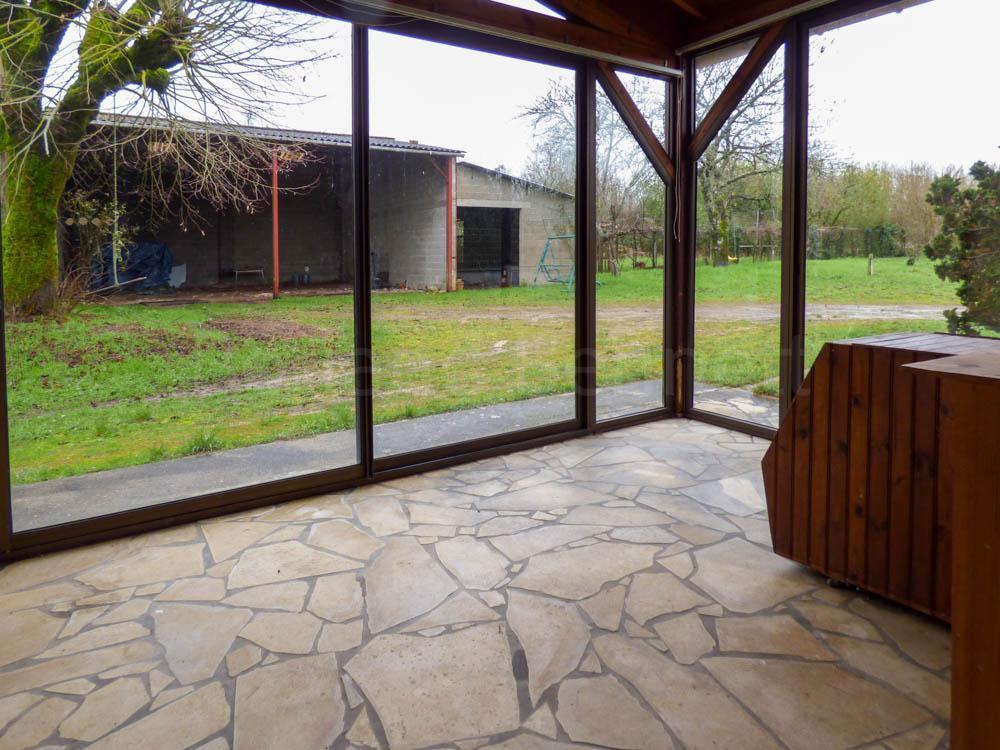 Detached stone house with outbuildings + large garden