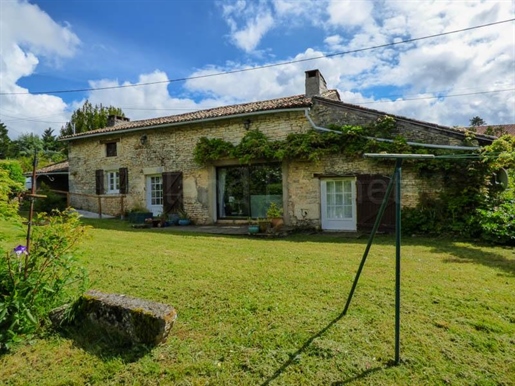 Detached stone country house with pretty garden