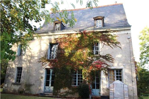 Touraine, 10 kms. From Tours Centre, in the heart of a village, 16th-17th century manor house of 32