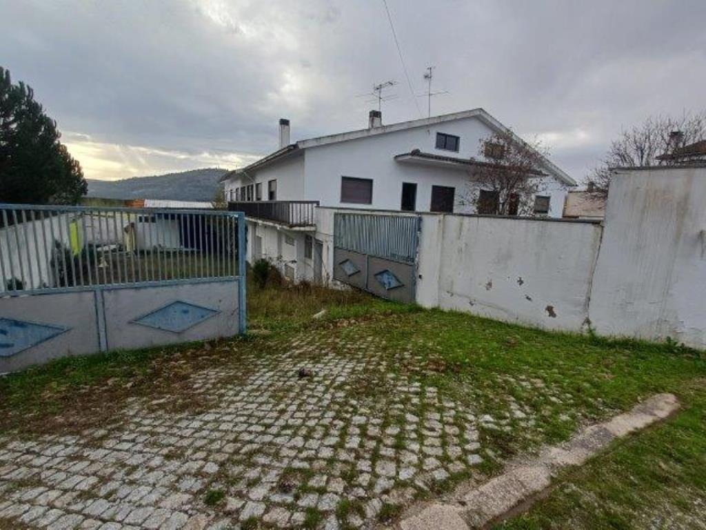 Three-Story House with Warehouse in Mangualde – Investment Opportunity