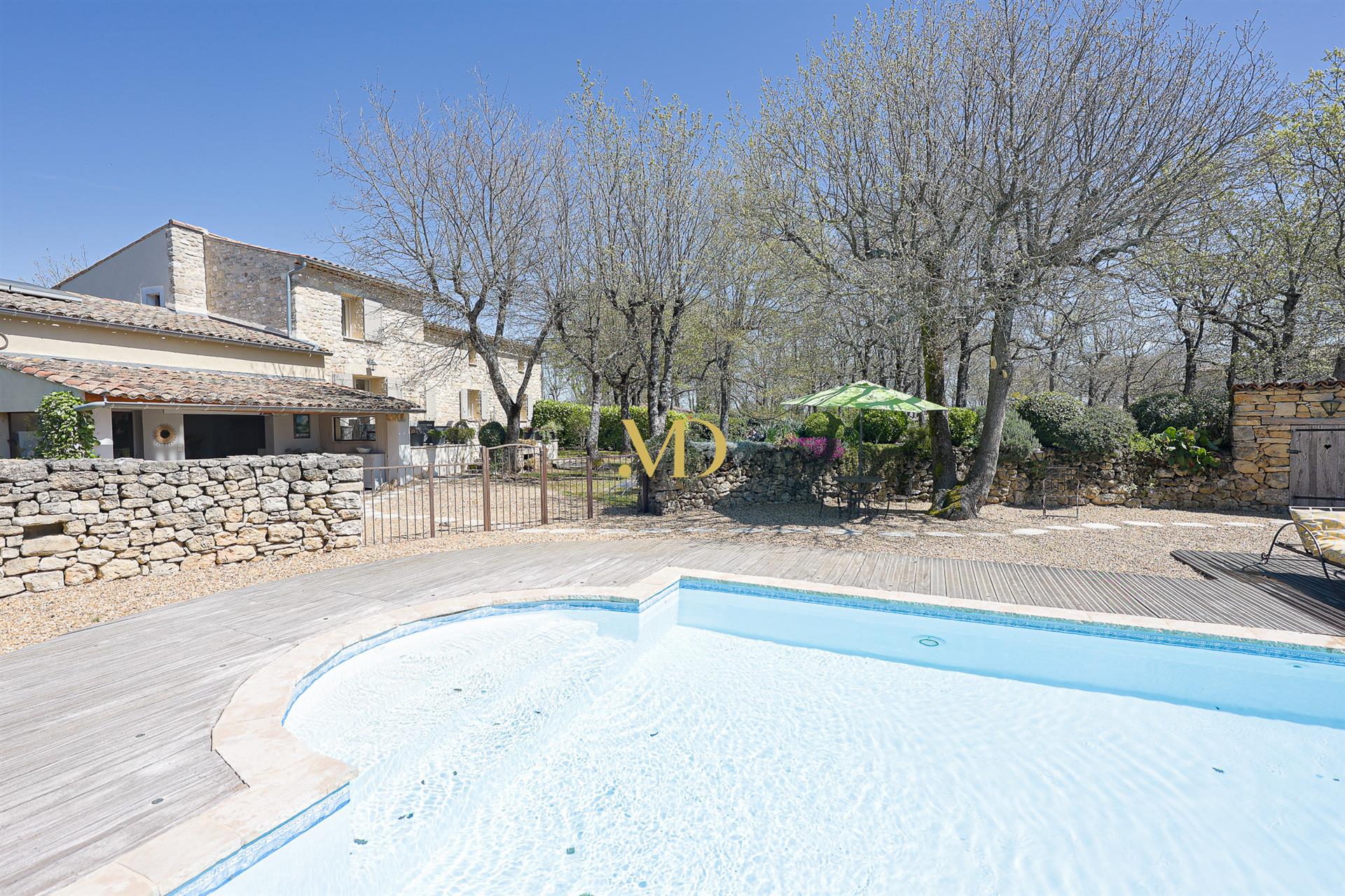 Charming stone property with Luberon view, swimming pool and outbuildings