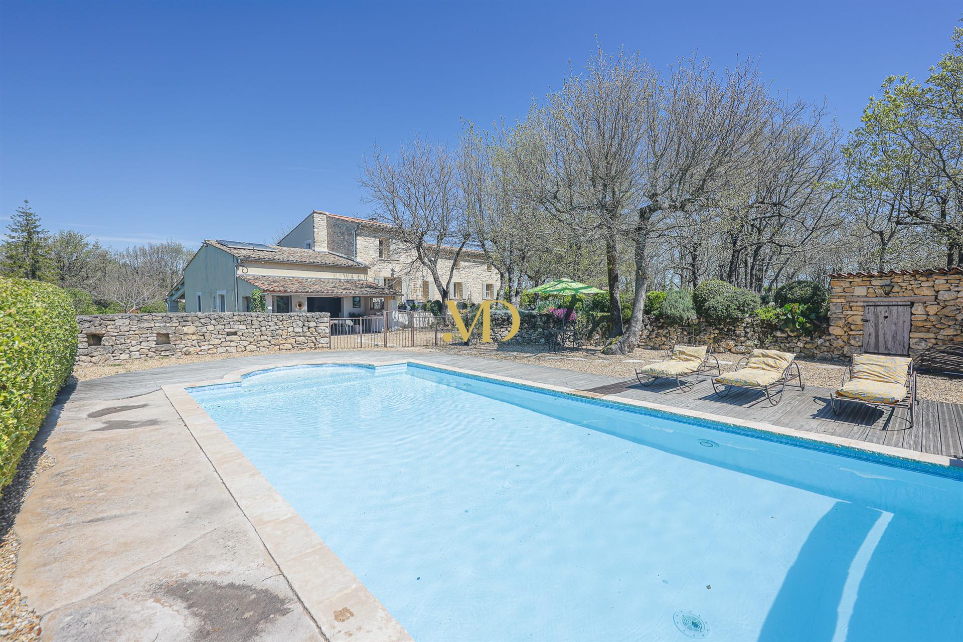 Charming stone property with Luberon view, swimming pool and outbuildings