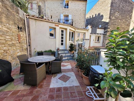 Pretty village house with 132 m² of living space, terrace and courtyard near Pezenas.