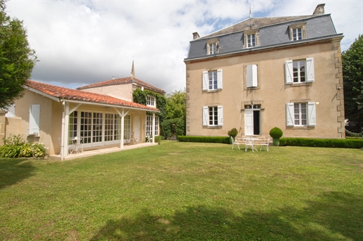 In the Gers, in Marciac, sumptuous manor house with outbuildings nestling in lovely garden.
