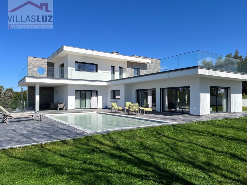 Modern dream home in the nature with panoramic views, luxury & potential