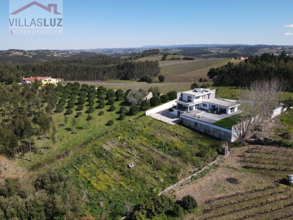 Modern dream home in the nature with panoramic views, luxury & potential