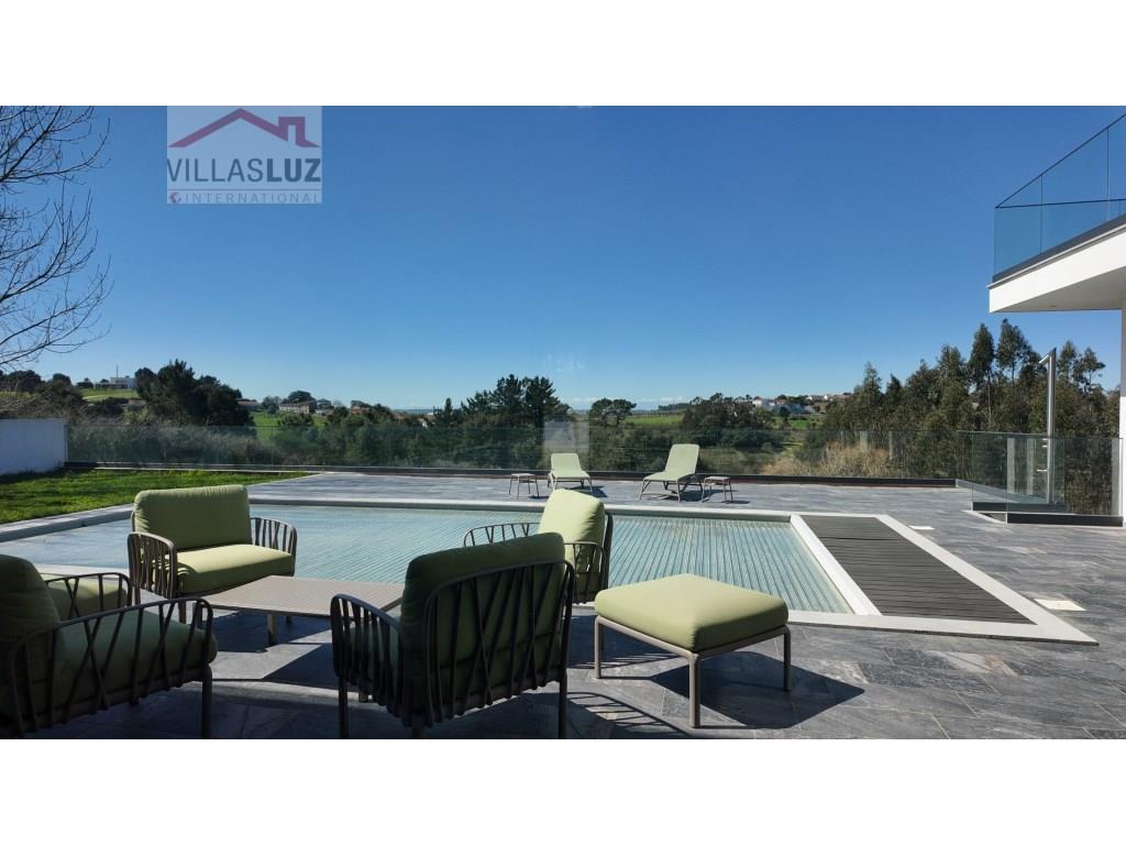 Modern dream home in the nature with panoramic views, luxury & potential