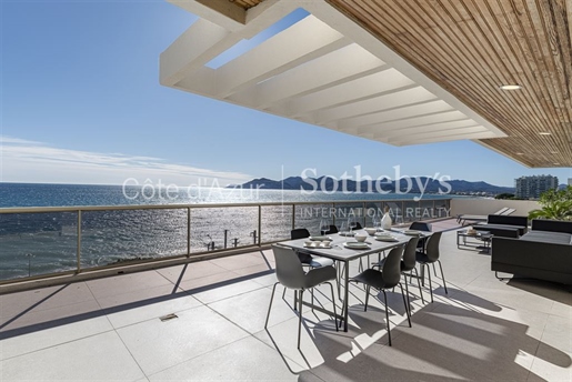 Luxurious penthouse with 172 m² terrace and panoramic sea view.