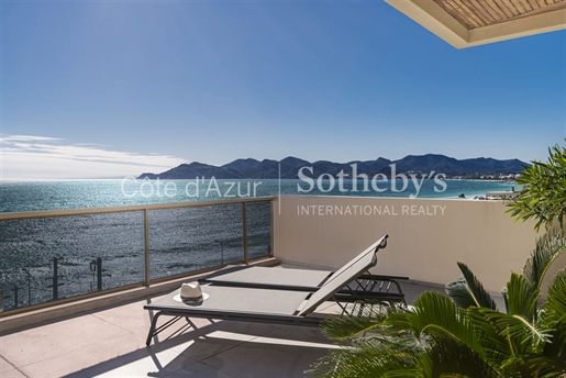 Luxurious penthouse with 172 m² terrace and panoramic sea view.