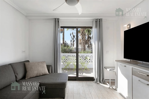 Entdecken Sie dieses exklusive Apartment im Herzen von Playa de las Américas, das sich im ersten Sto