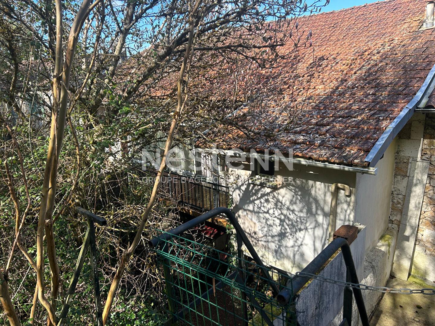 Village house to renovate located in Saint Pardoux La Rivière with basement and land
