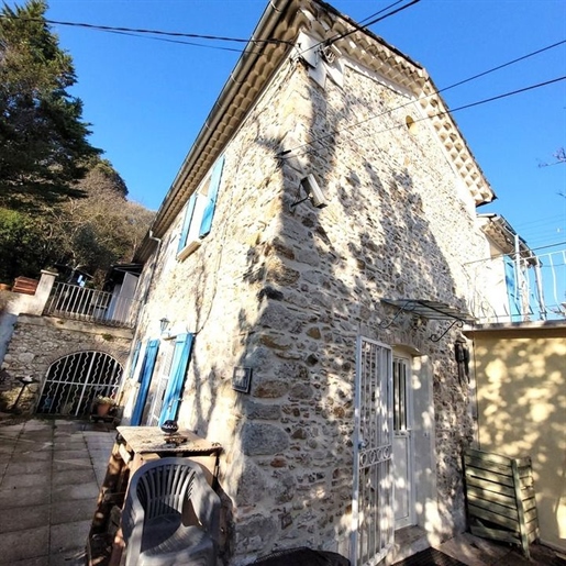 Stenen huis met drie slaapkamers en een kantoor in Alès
