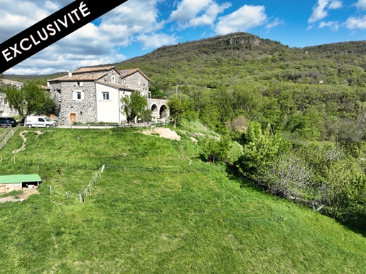 Hamlet house of 90m² with a plot of land of 2365m² in Lussas