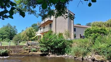 A beautiful 4 bedroom former watermill with 2 completely renovated gites, barn, courtyard and garden
