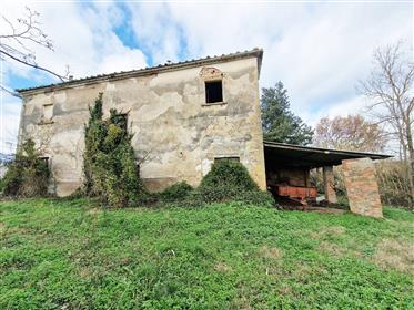 Farmhouse in need of renovation with lots of potential