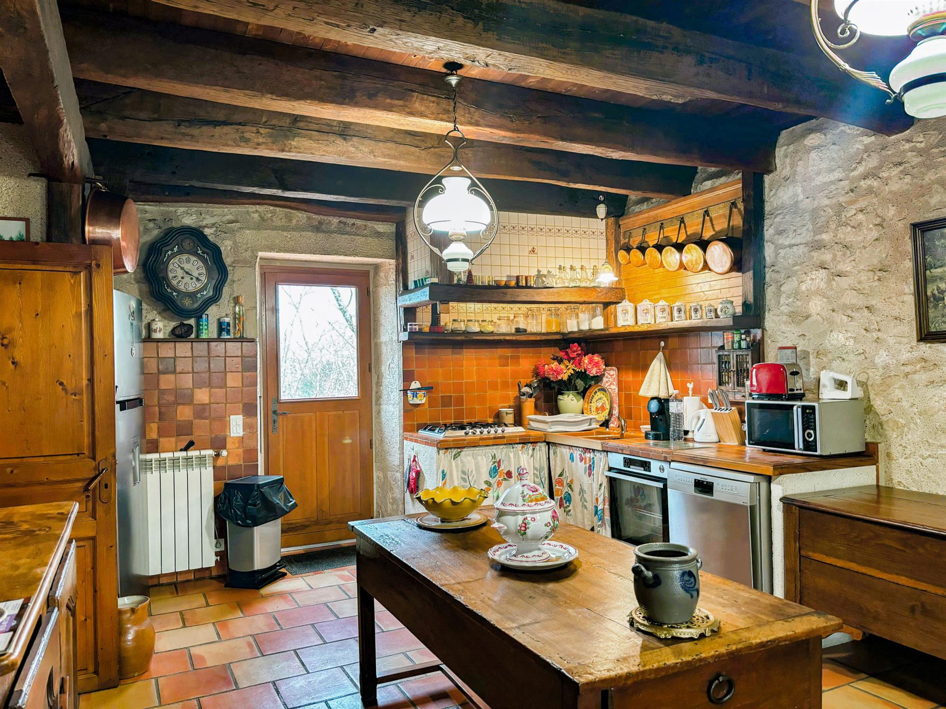 Stone house on approximately 2 hectares of land. 3 bedrooms, swimming pool. Stone outbuildings. A lo