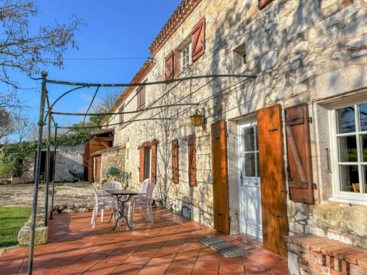 Stone house on approximately 2 hectares of land. 3 bedrooms, swimming pool. Stone outbuildings. A lo