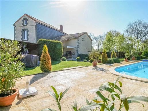 Beautiful Property, Swimming Pool, Plus Rentable Income Set In Landscaped Gardens