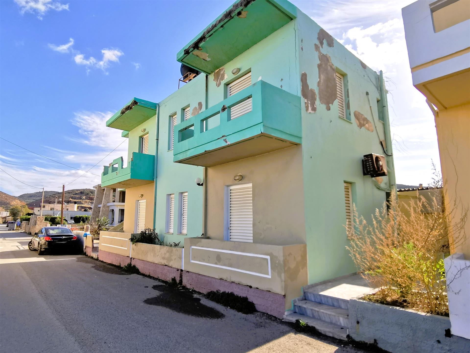 Building with two apartments facing the sea, near Kissamos, Crete 