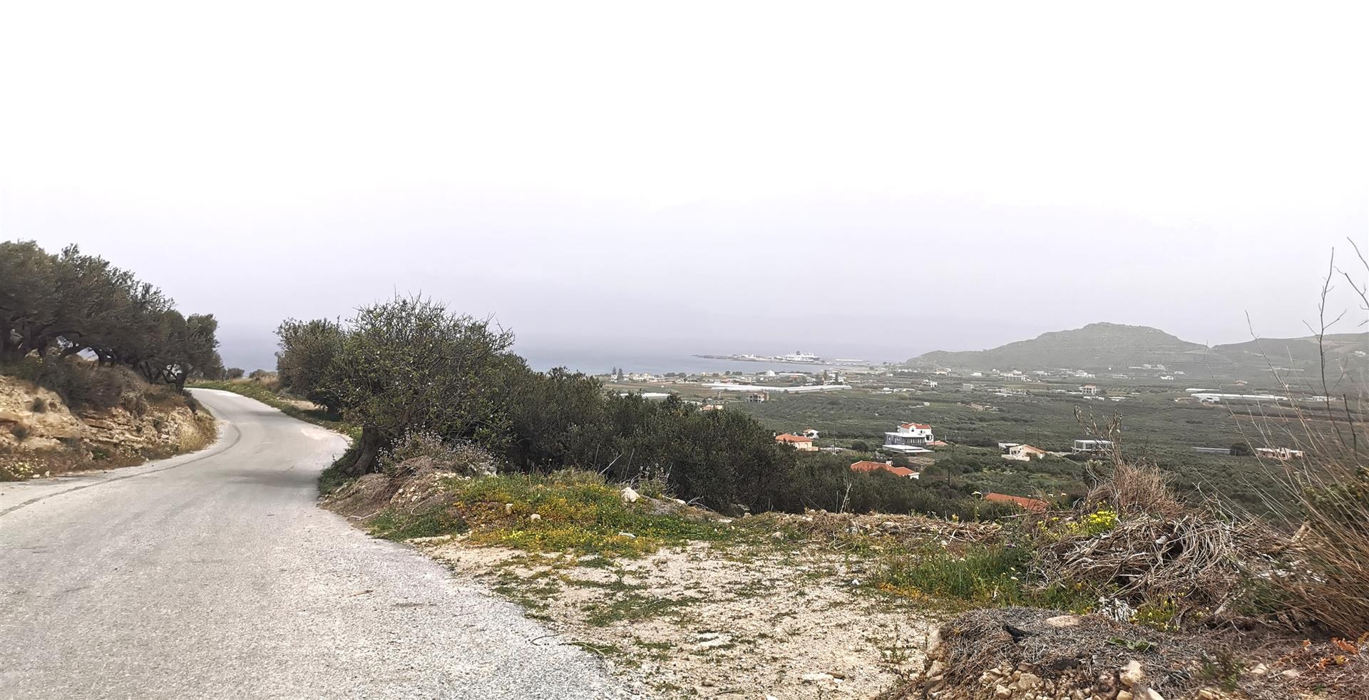 Building land with olive trees, sea and mountain views