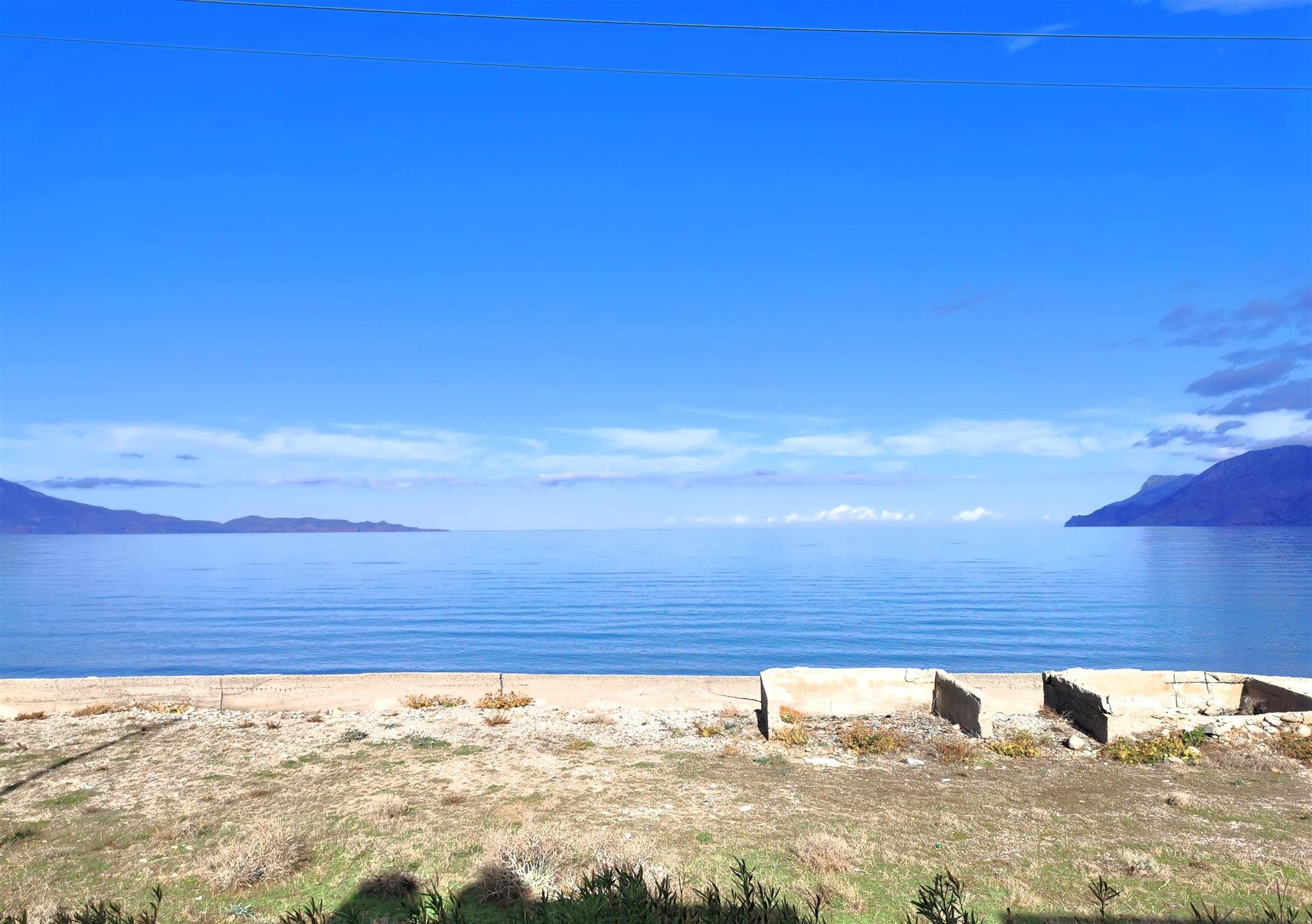 Building with four apartments facing the sea, near Kissamos, Crete 