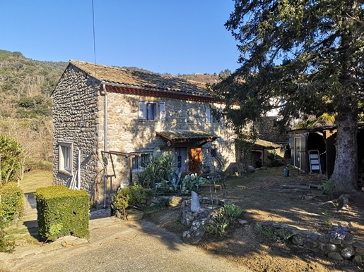 In Saint-Fortunat-Sur-Eyrieux (07), stone house 5 rooms 100 m2