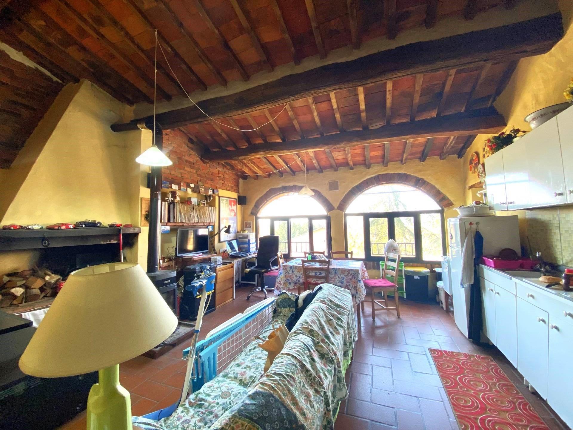 Farmhouse/Rustic in the Tuscan countryside which has three apartments and 2000 sqm of surrounding l