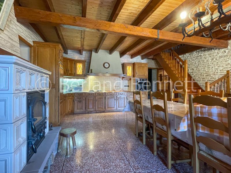 Gorgeous stone house with outbuildings + land