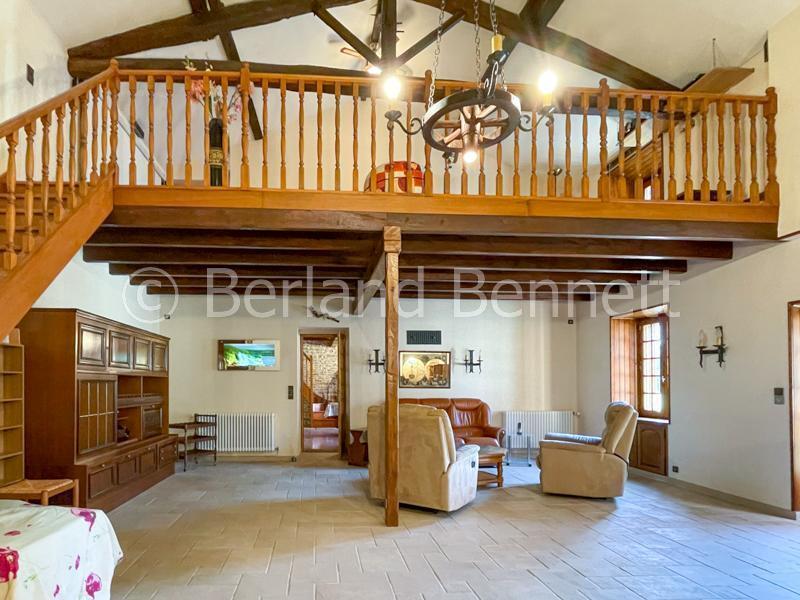 Gorgeous stone house with outbuildings + land