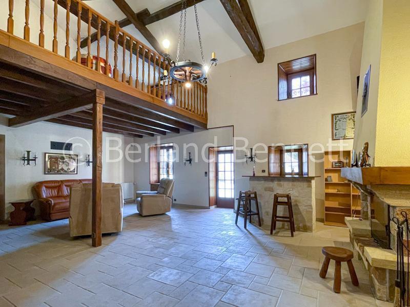 Gorgeous stone house with outbuildings + land
