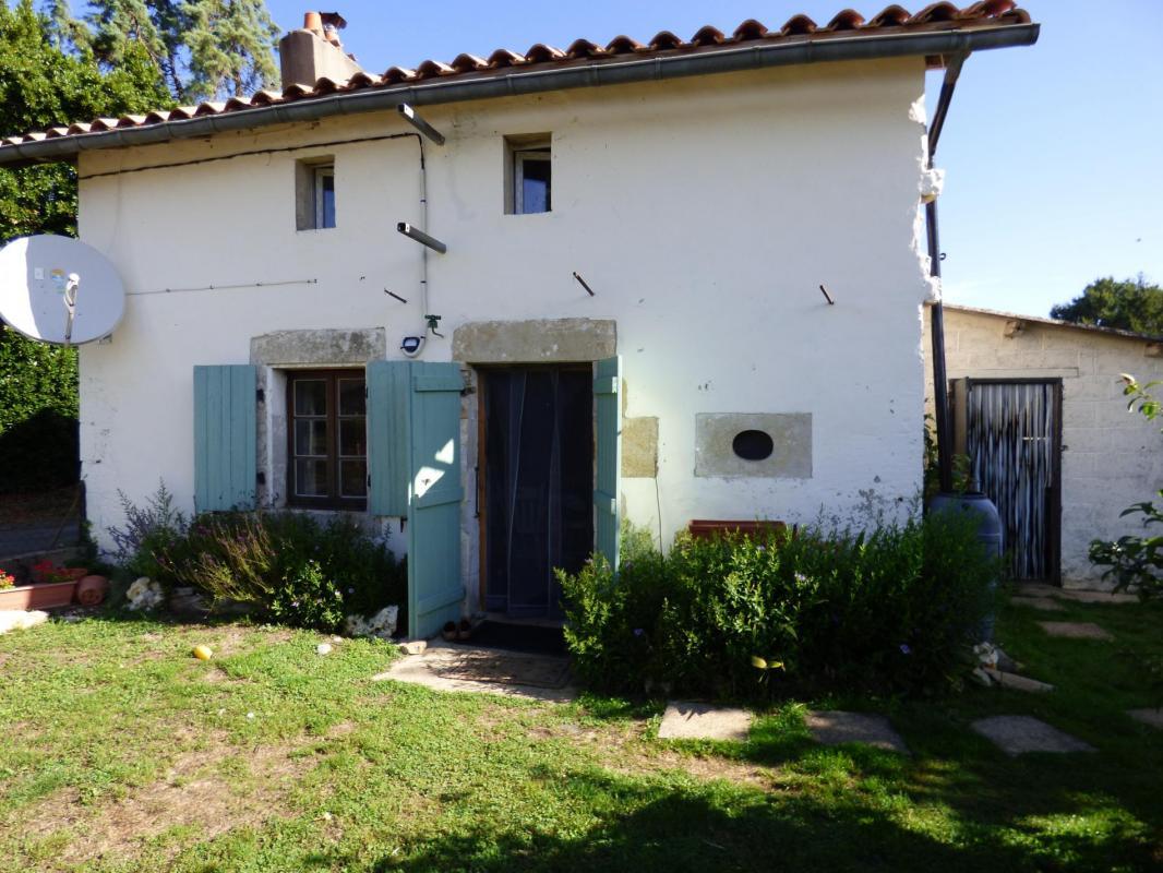 Pretty detached stone cottage with large garden