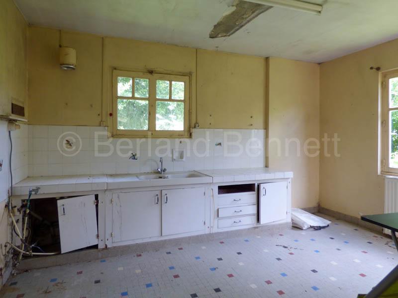 Great location for this pretty detached stone house to renovate