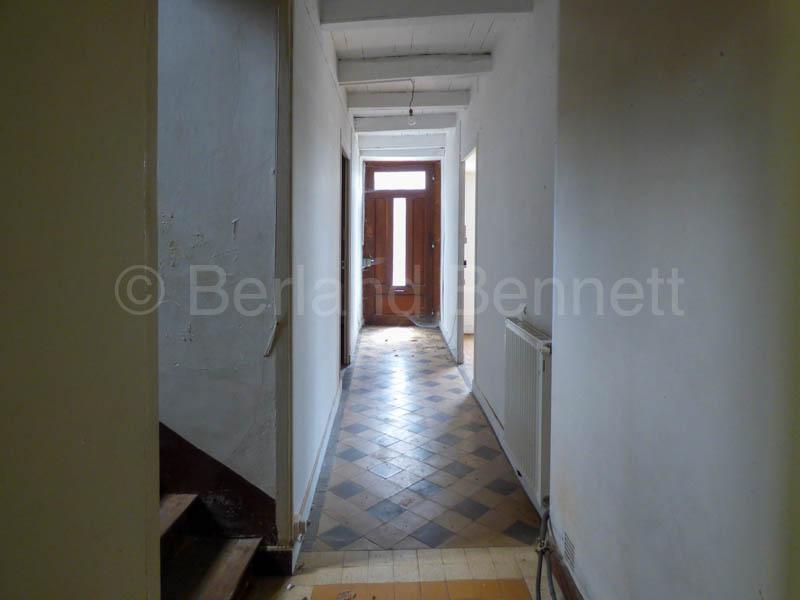 Great location for this pretty detached stone house to renovate