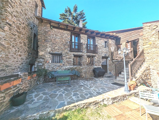 Property consisting of two stone houses with garden and