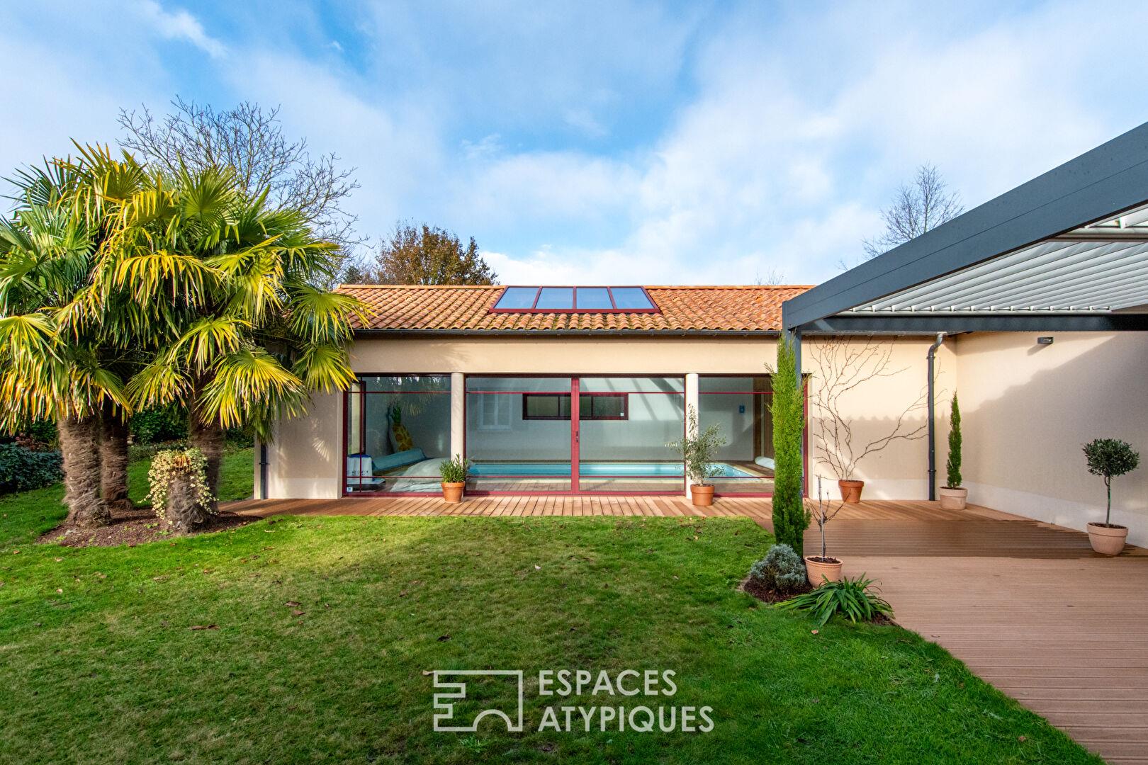 Single storey opening onto garden, terrace and indoor swimming pool