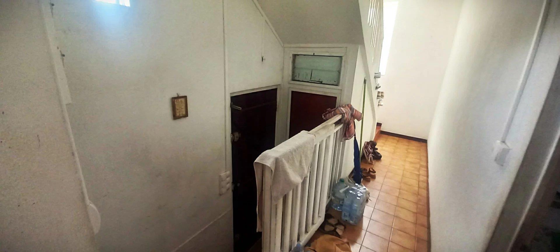 For Sale – House divided into two T3 duplex apartments with courtyards and parking in Saint-Denis