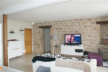 Village character house in good condition of 104 m² of living space with terrace, cellar and garage.