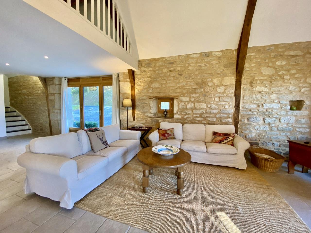 Stone farmhouse with attached barn conversion