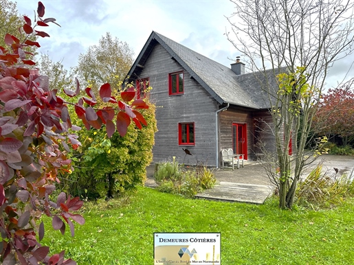 Wooden frame property with wooded park in the heart of a coastal village between Etretat and Yport