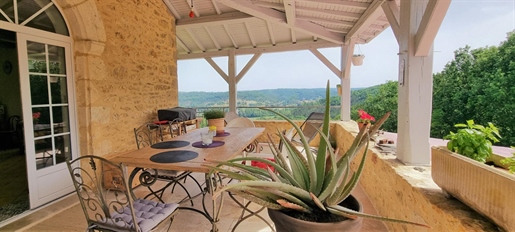 Real estate complex offering cottages, a pool, and a panoramic view.