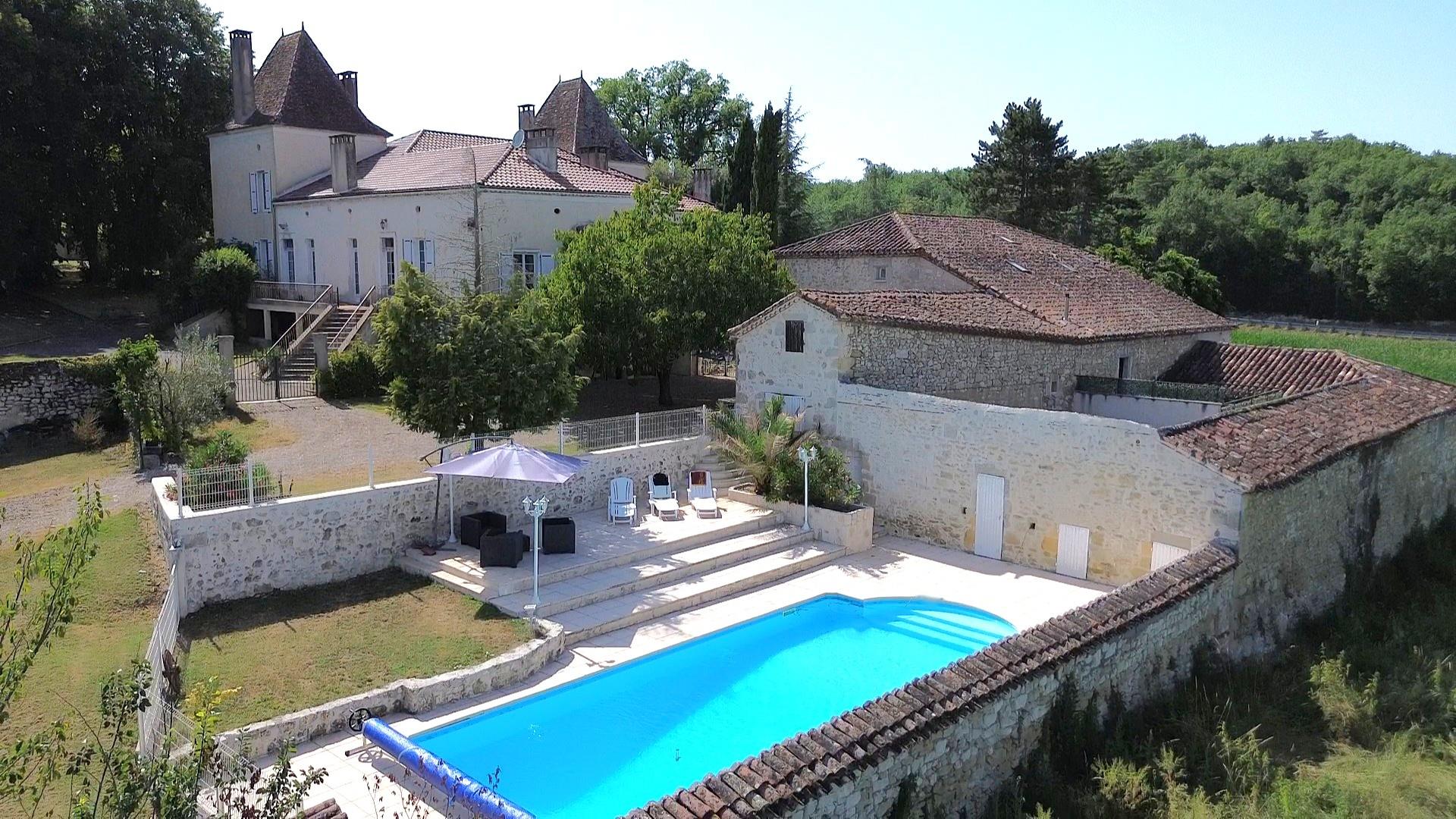 Charming residence and its renovated outbuildings.