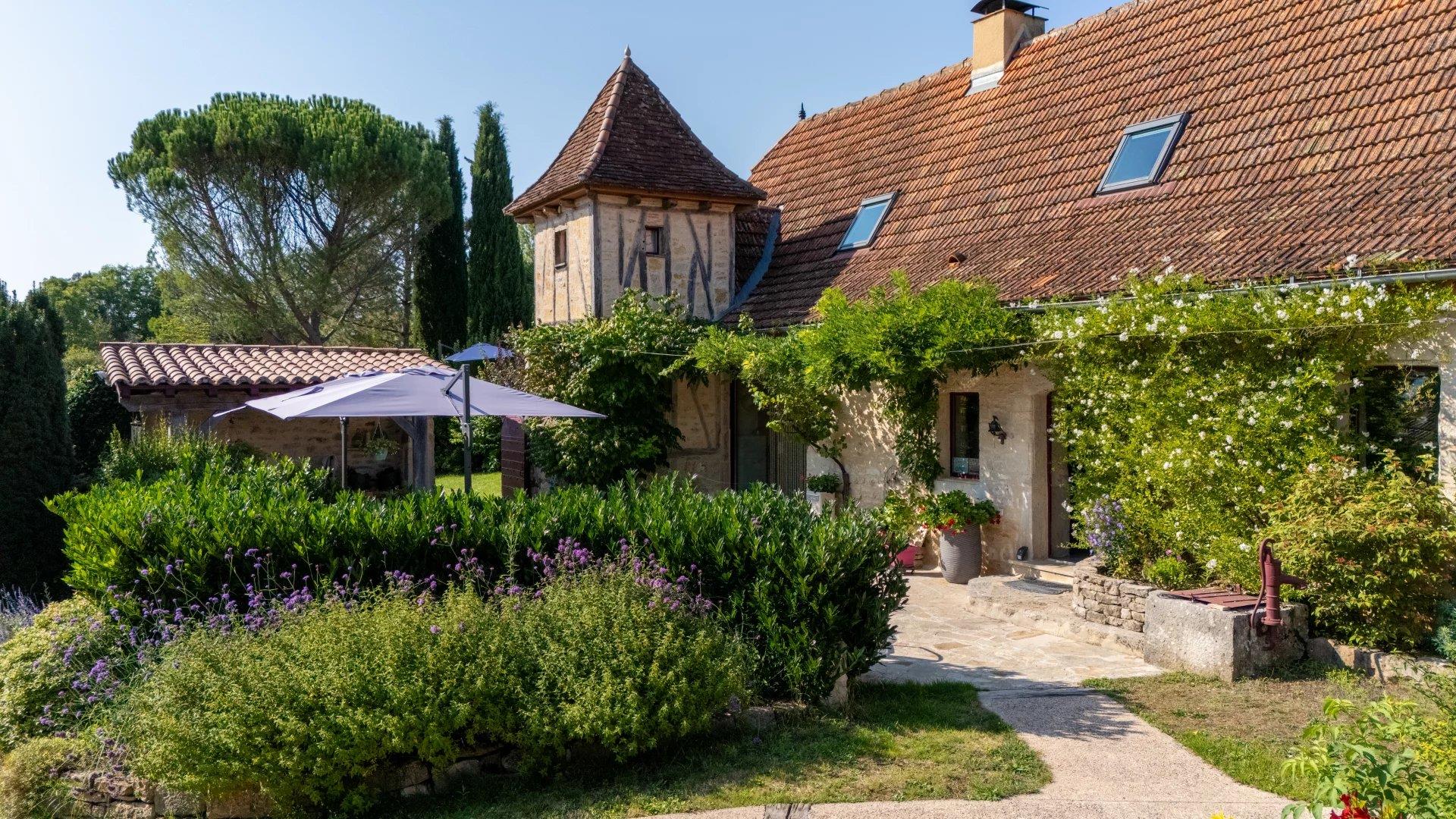 Immaculately presented stone ensemble with pool, spa, boules terrain and landscaped gardens