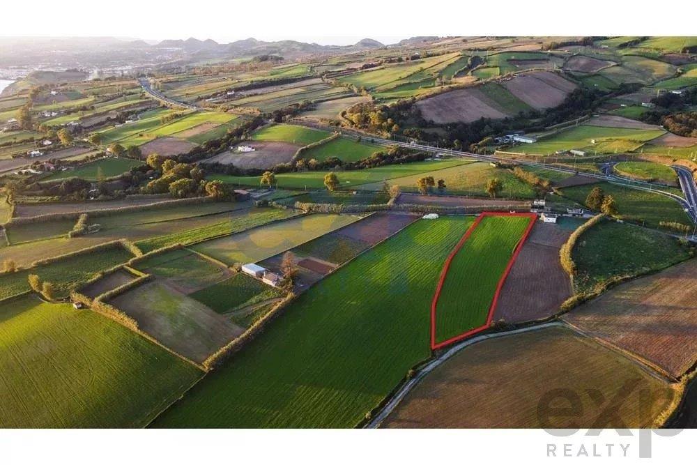 Land with Sea and Mountain Views