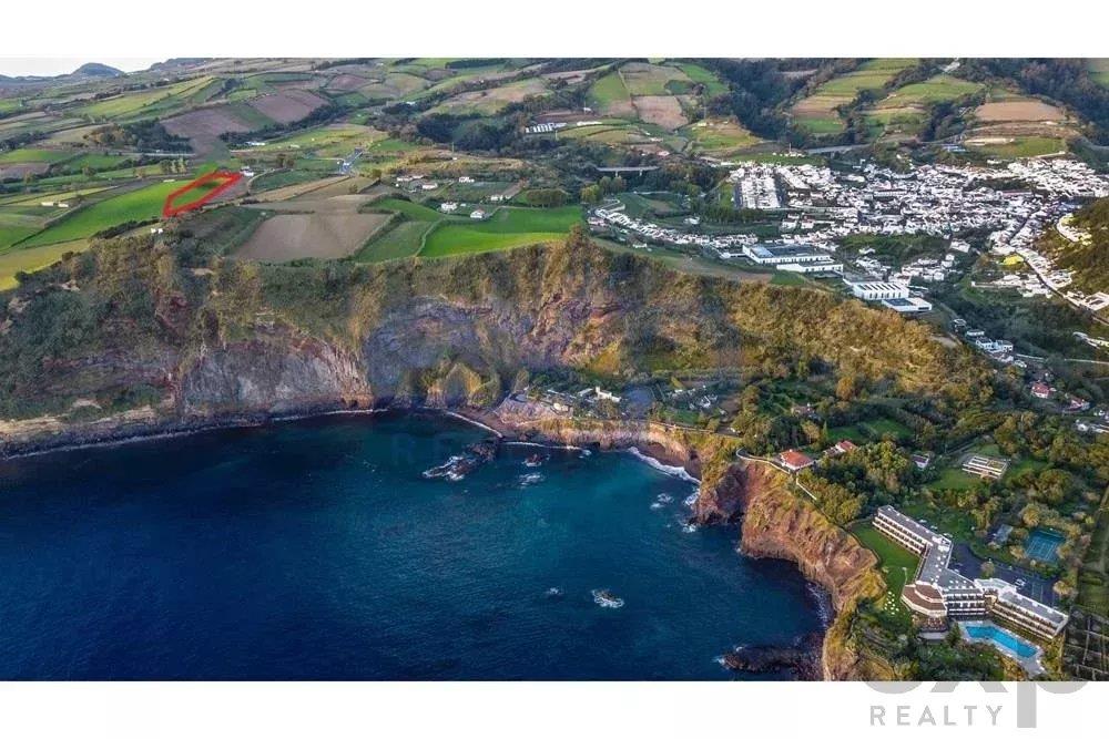 Land with Sea and Mountain Views