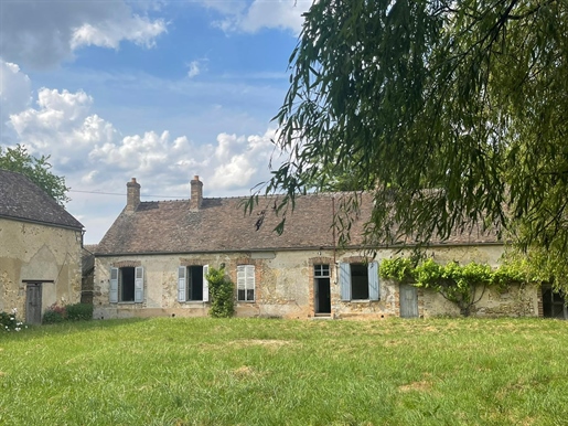 Ancienne ferme authentique sur 6.270m2 de jardin à Dollot