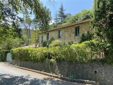 Beautifully renovated peaceful stone property with land in small village with walking distance to ri