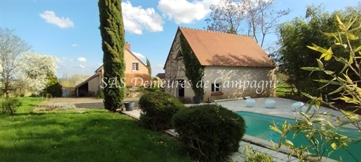Charming farmhouse dating from 1887, approx. 175M2 facing south, in the heart of a park of almost 40