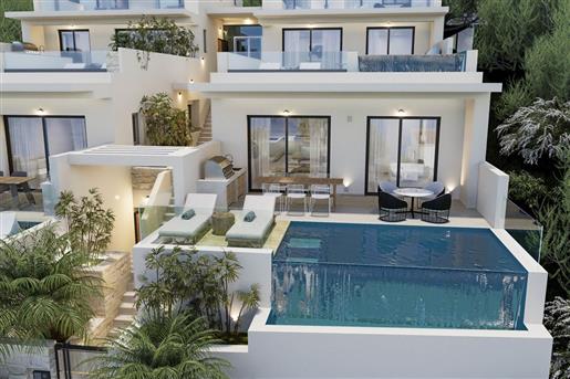 Nouvel appartement de luxe avec piscine privée et vue sur la mer à distance de marche de la plage à