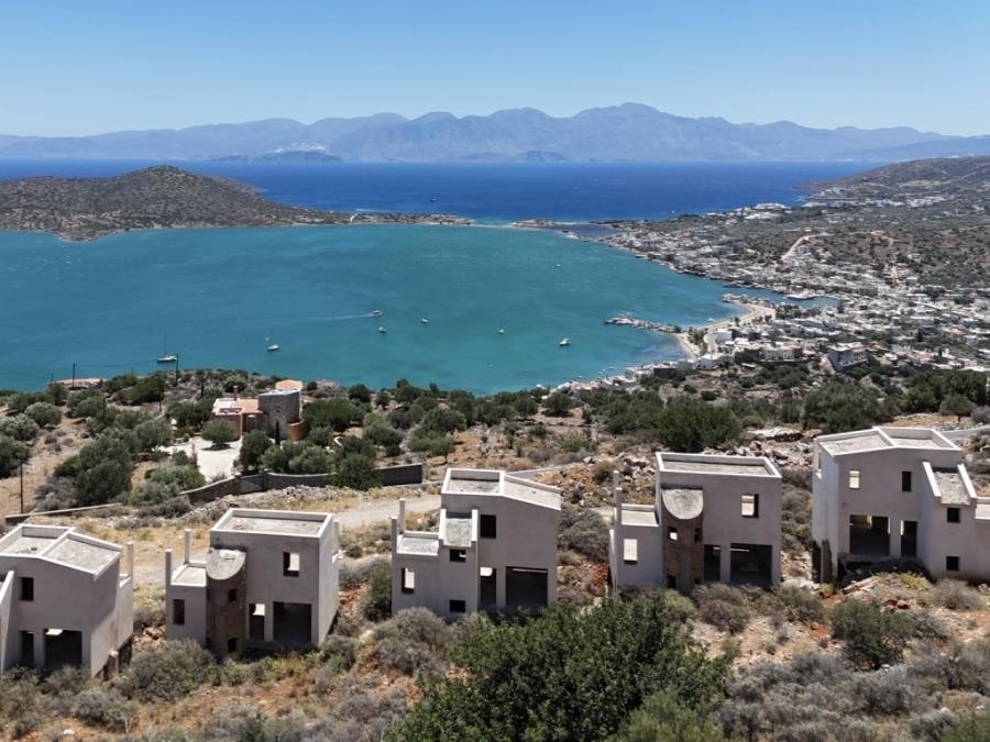Unfinished complex of villas with swimming pools and sea views for sale